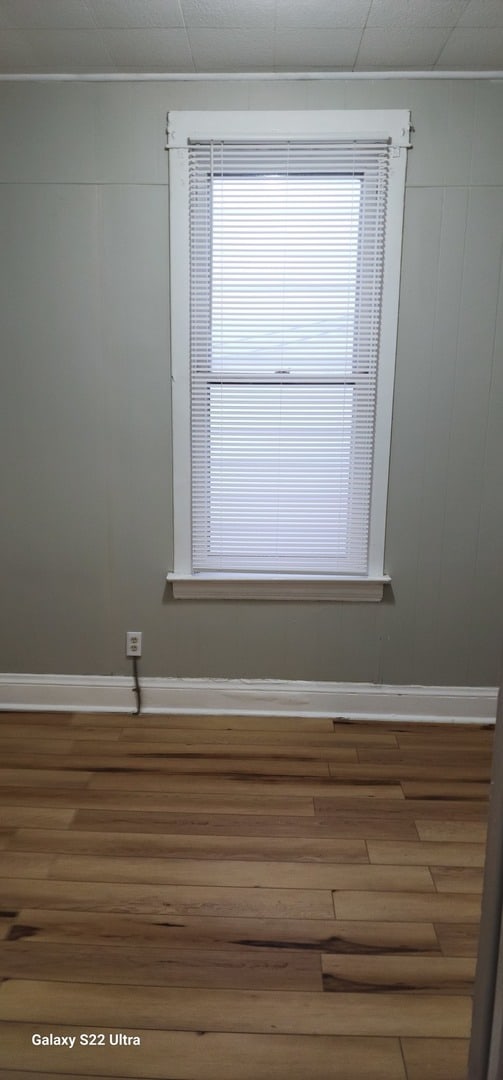 interior details featuring wood-type flooring