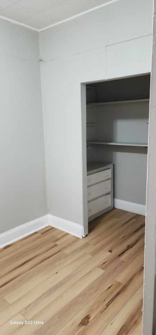 interior space with hardwood / wood-style flooring