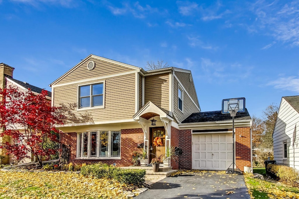 view of front of property featuring a garage