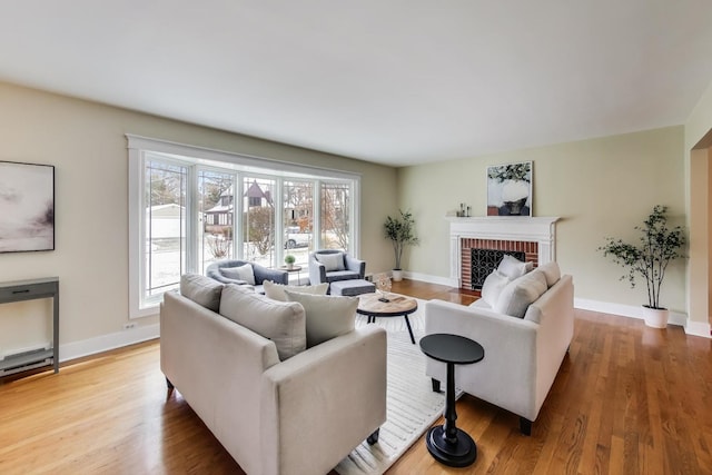 living room featuring hardwood / wood-style floors and a fireplace