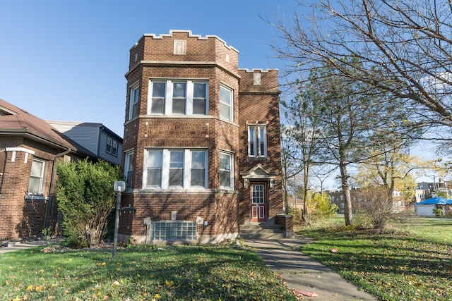 view of front facade with central AC and a front yard