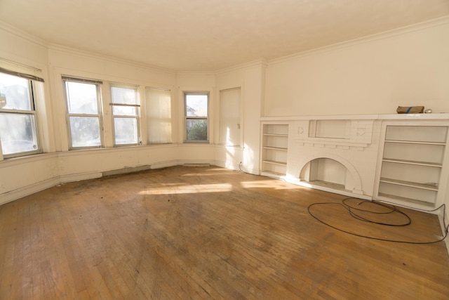 7351 S Indiana Ave, Chicago, IL 60619 - unfurnished living room with hardwood / wood-style floors, crown molding, and baseboards