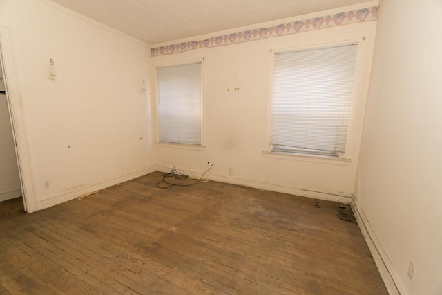 7351 S Indiana Ave, Chicago, IL 60619 - empty room with hardwood / wood-style floors, crown molding, and baseboards