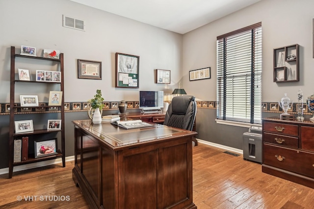 office area with light wood-type flooring