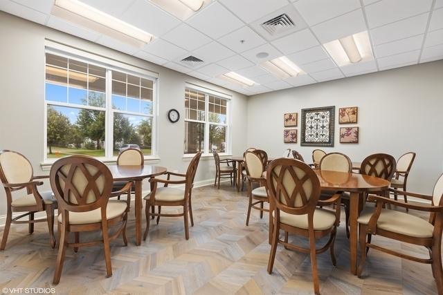 dining space featuring a paneled ceiling