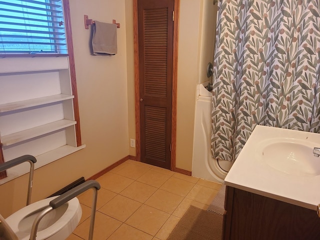 bathroom featuring tile patterned floors and vanity