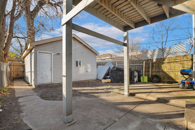 view of patio with an outdoor structure