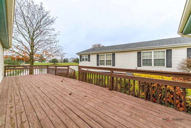 deck featuring a water view