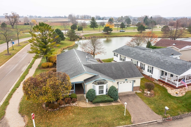 drone / aerial view with a water view