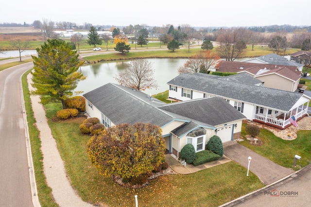 birds eye view of property featuring a water view