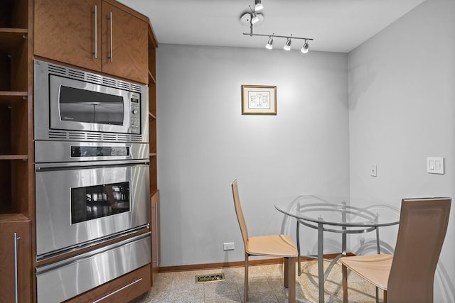 kitchen with appliances with stainless steel finishes