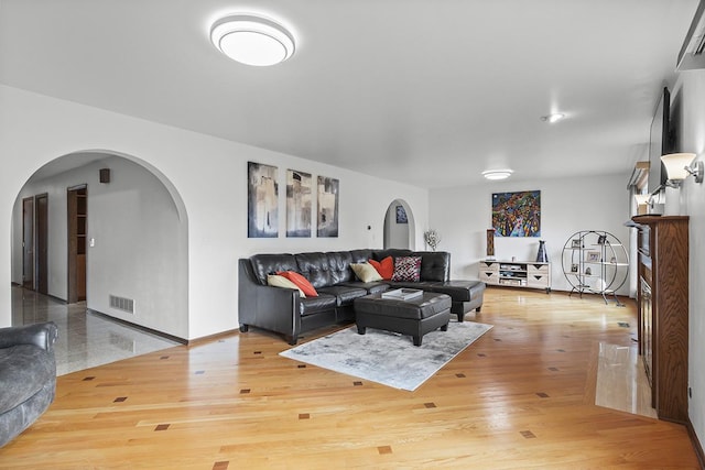 living room with hardwood / wood-style floors