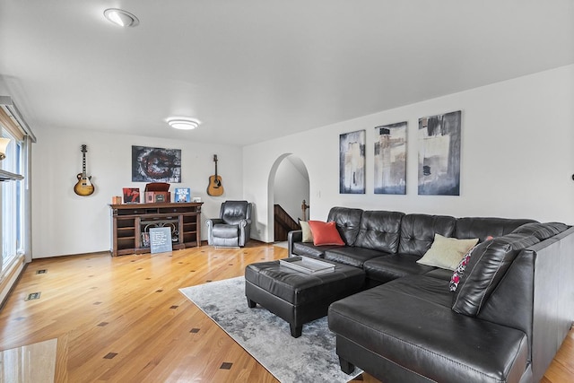 living room with hardwood / wood-style flooring and plenty of natural light