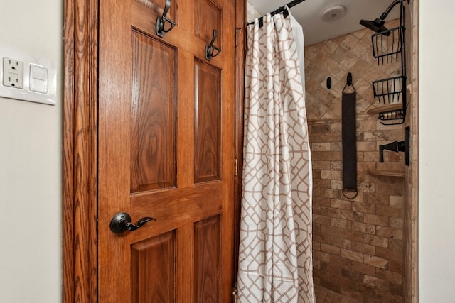 bathroom with curtained shower