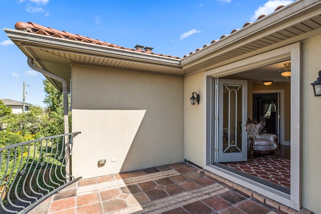 property entrance with a balcony