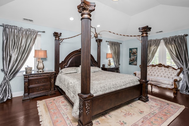 bedroom featuring wood-type flooring and lofted ceiling