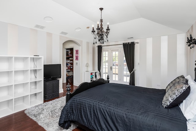 bedroom with lofted ceiling, access to outside, french doors, a notable chandelier, and dark hardwood / wood-style flooring