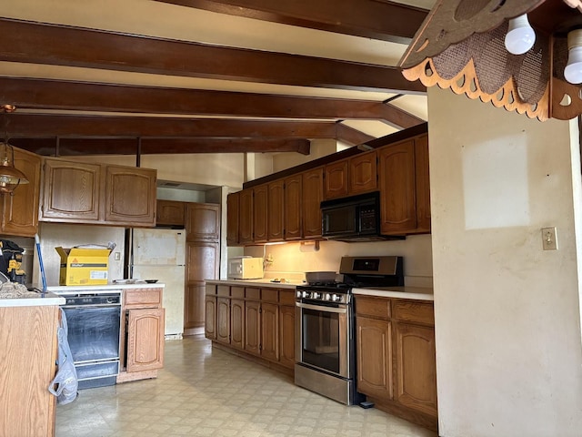 kitchen with black appliances and lofted ceiling with beams