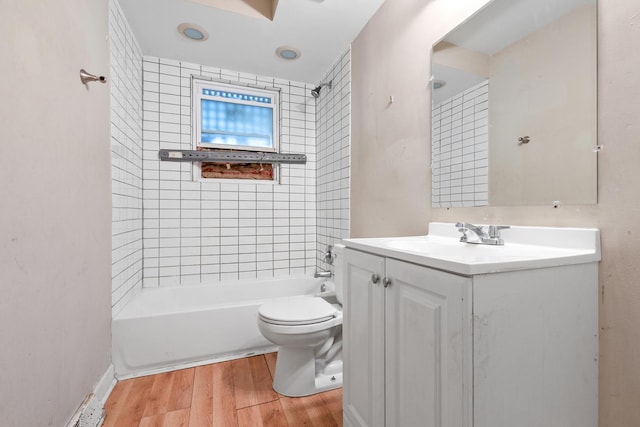 937 E 148th St, Dolton, IL 60419 - bathroom featuring wood finished floors, vanity, and shower / bathtub combination