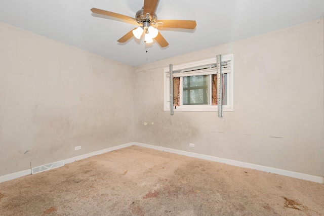 937 E 148th St, Dolton, IL 60419 - spare room featuring carpet flooring and a ceiling fan