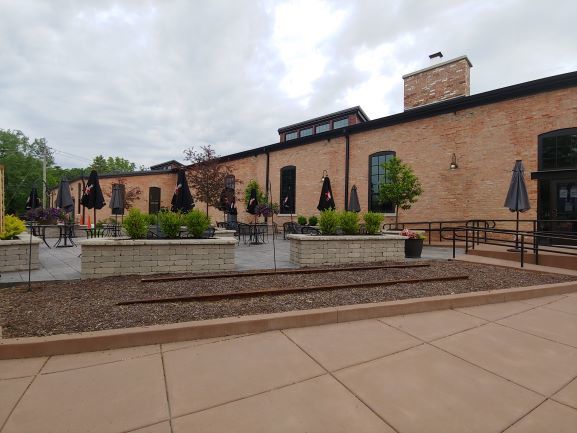 view of property's community featuring a patio area