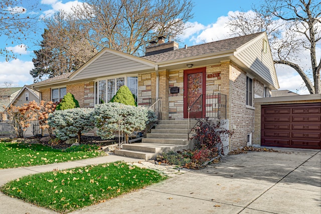 view of front of home with a garage