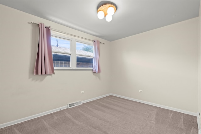 spare room with carpet flooring