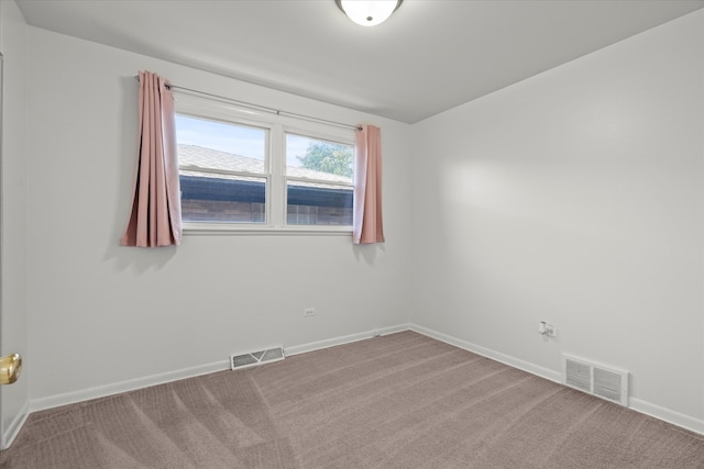 empty room with carpet flooring