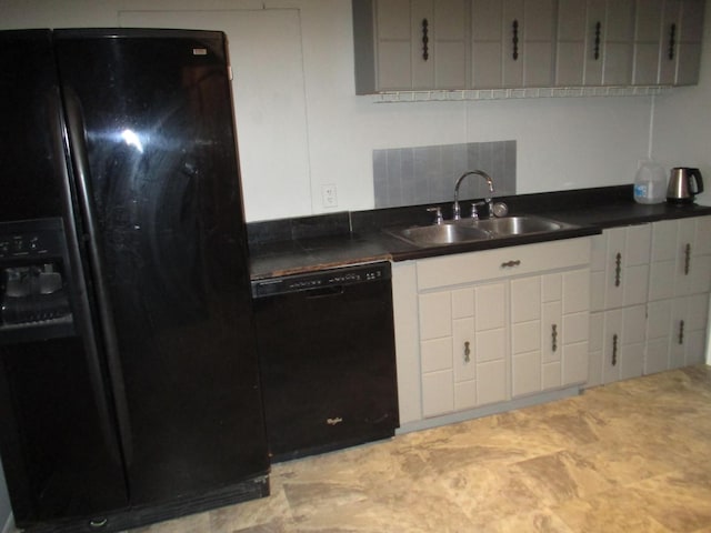 313 E Jackson St, Seneca, IL 61360 - kitchen with black appliances, a sink, and dark countertops