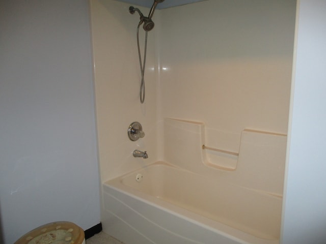 bathroom with shower / bathing tub combination