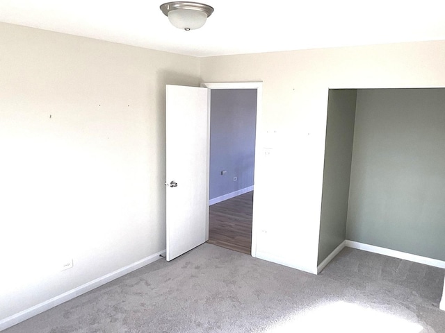 unfurnished bedroom with carpet