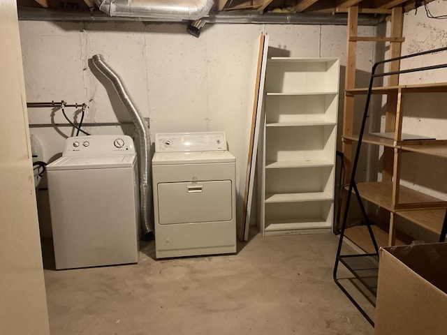 washroom featuring washer and dryer