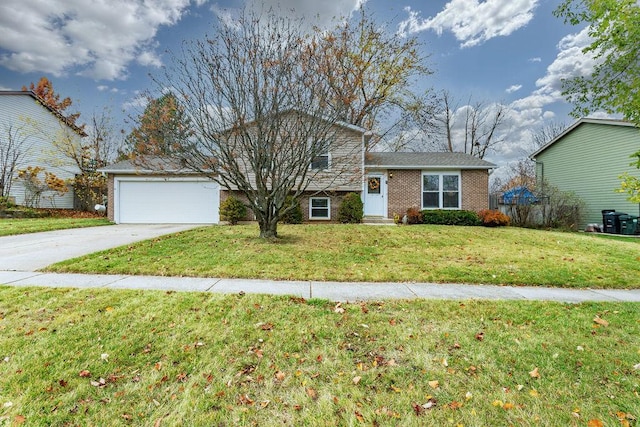 view of front of home featuring a front yard and a garage