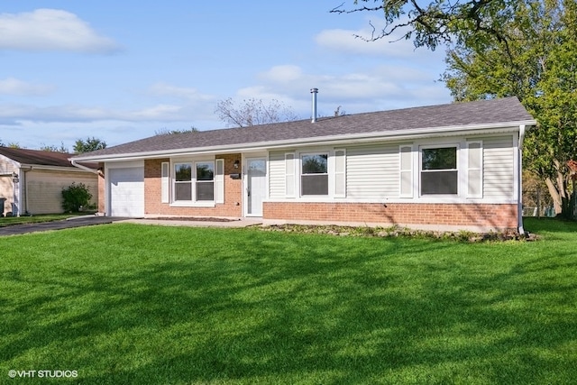 single story home featuring a front lawn and a garage