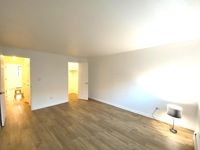 closet featuring a baseboard heating unit