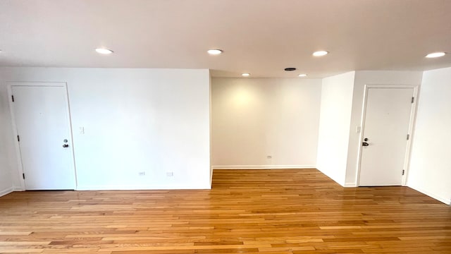 unfurnished room featuring light hardwood / wood-style flooring