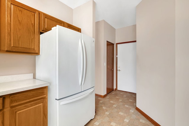 kitchen featuring white fridge