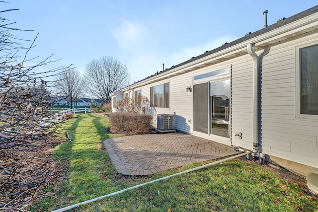 exterior space featuring cooling unit and a patio area