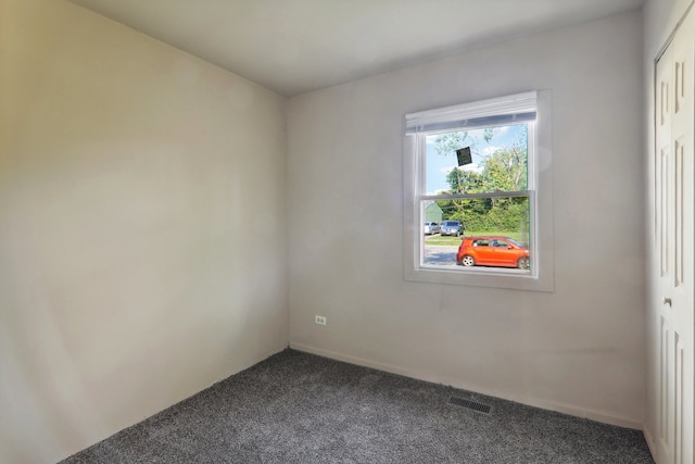 spare room with carpet floors