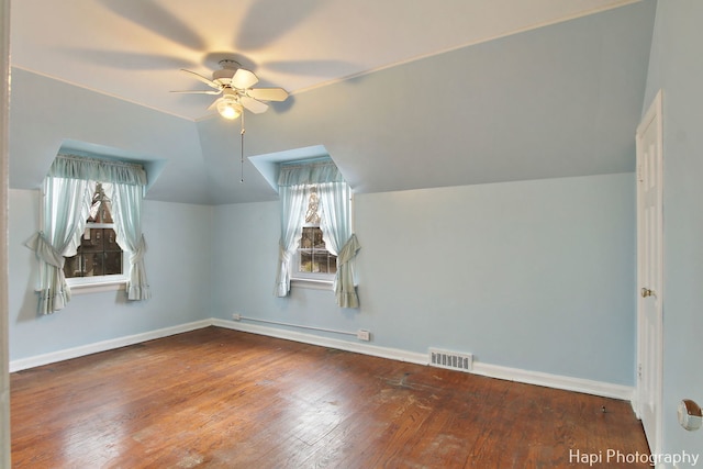 bonus room with ceiling fan, hardwood / wood-style floors, and lofted ceiling