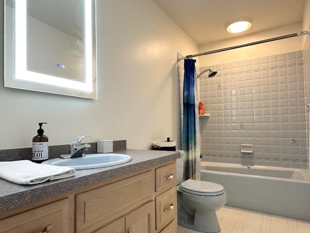 full bathroom featuring vanity, toilet, and shower / tub combo