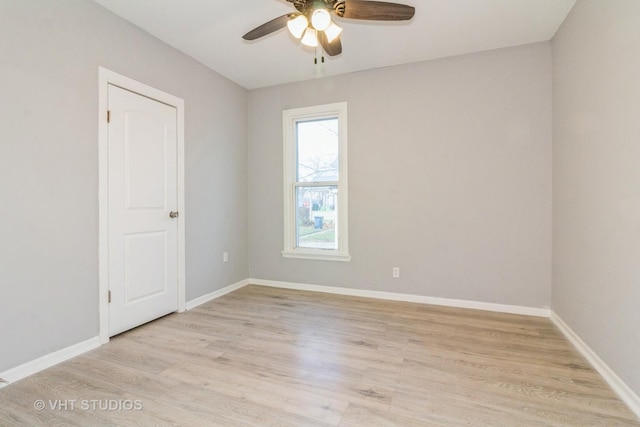 unfurnished room featuring light wood-type flooring and ceiling fan