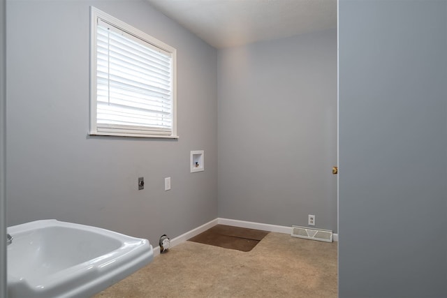 laundry area with washer hookup, hookup for an electric dryer, and light carpet