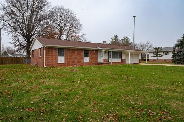 ranch-style home with a front yard