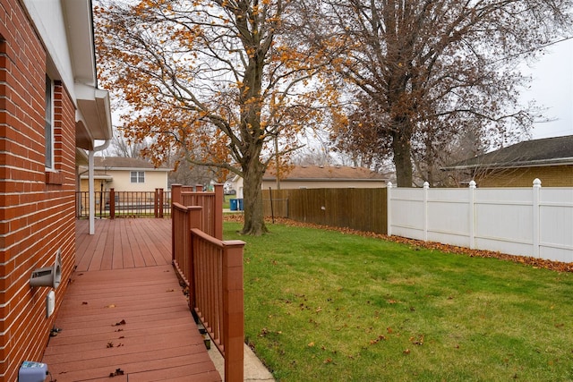 view of yard with a wooden deck