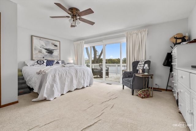 carpeted bedroom with access to outside and ceiling fan