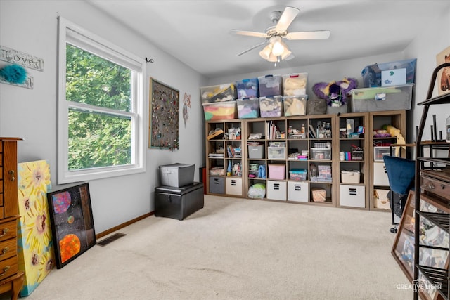 storage room with ceiling fan