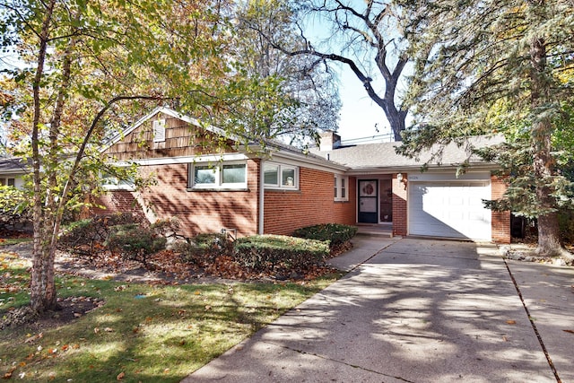 ranch-style house featuring a garage