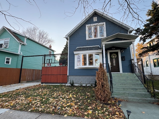 view of front of property featuring cooling unit