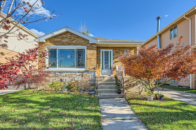 view of front of property with a front lawn